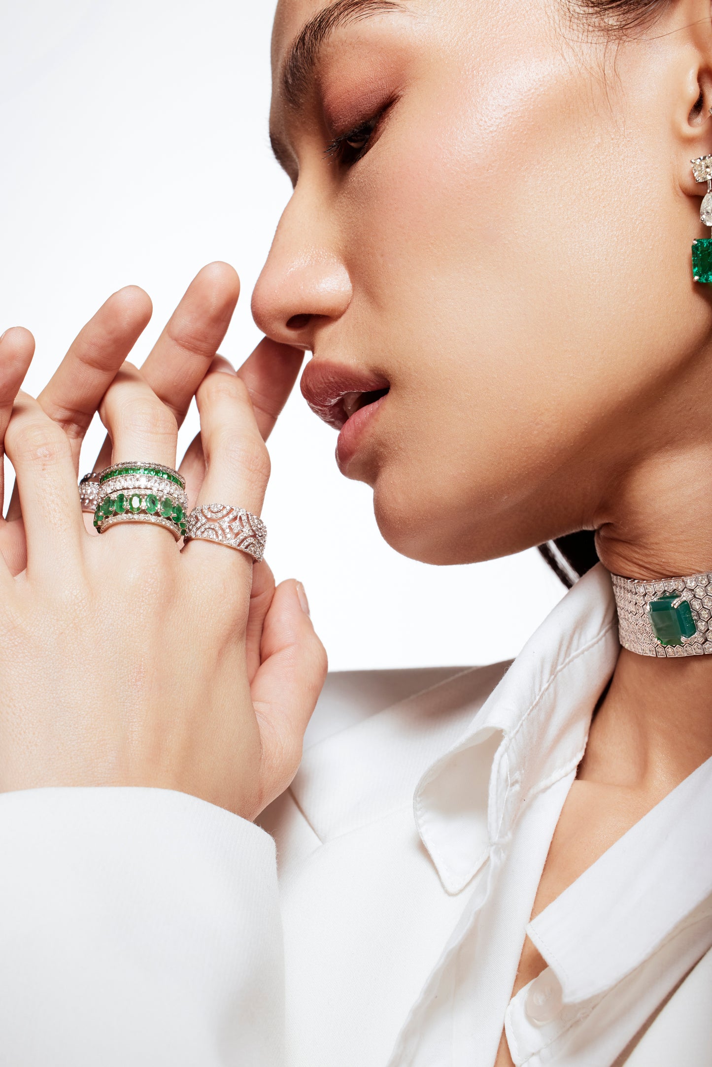 Oval Cut Emerald and Diamond Ring